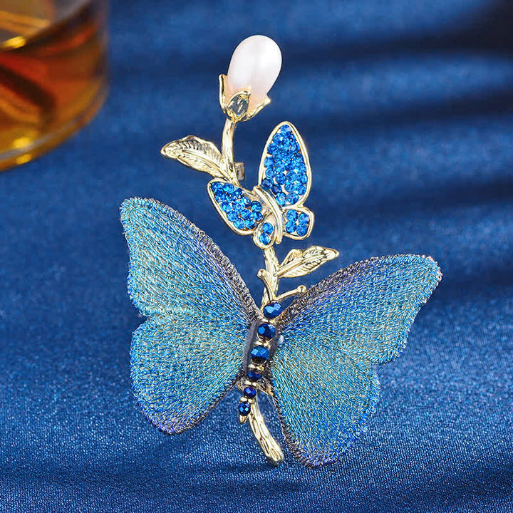 Broche en perles d'eau douce avec papillon brodé pour femme