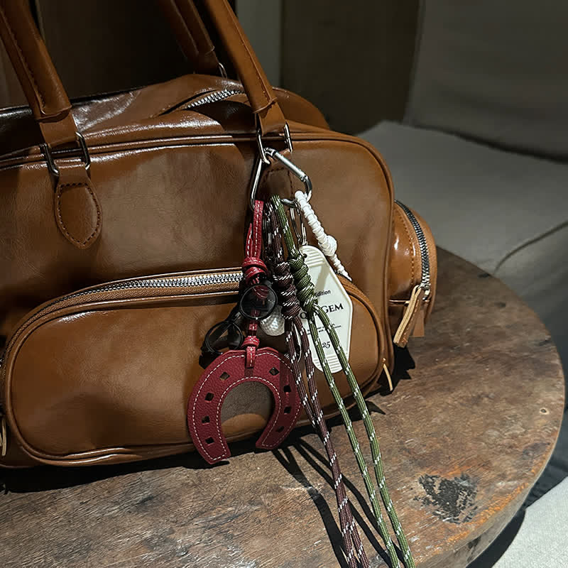 Porte-clés en cuir avec pendentif en forme de fer à cheval simple