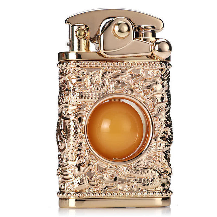 Briquet au butane rechargeable Dragon jouant avec une perle orange