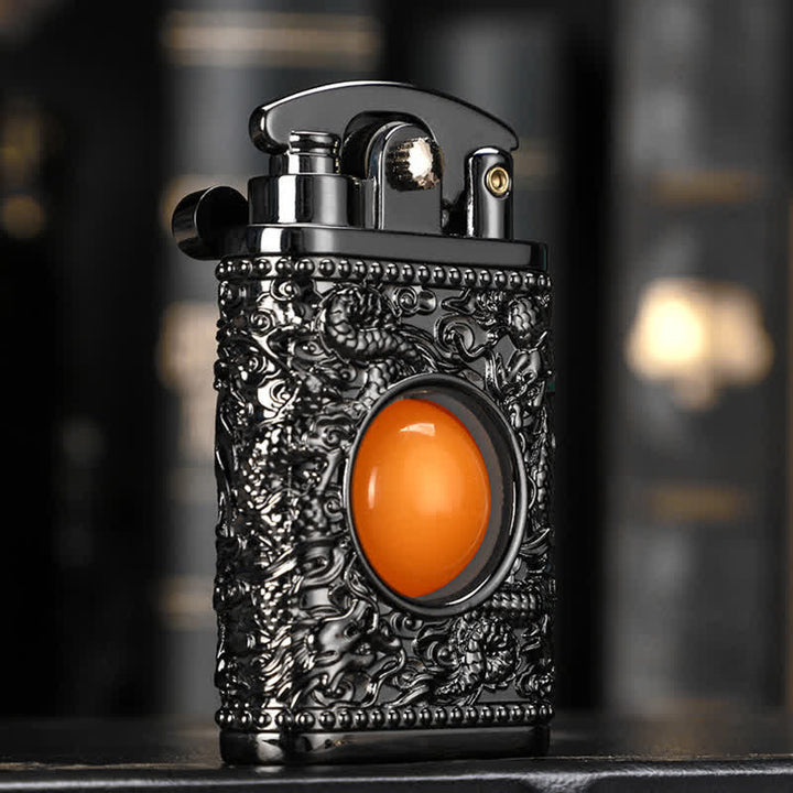 Briquet au butane rechargeable Dragon jouant avec une perle orange