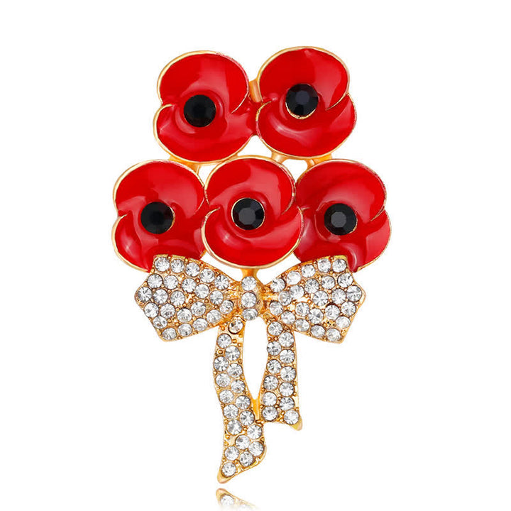 Broche fleur en strass avec noeud papillon et cinq coquelicots rouges