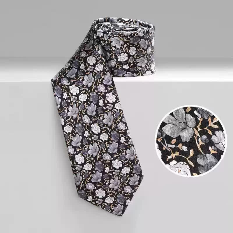 Cravate en pure soie à petits motifs floraux noirs et gris pour homme