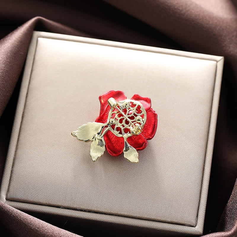 Broche fleur en strass rose rouge bleu