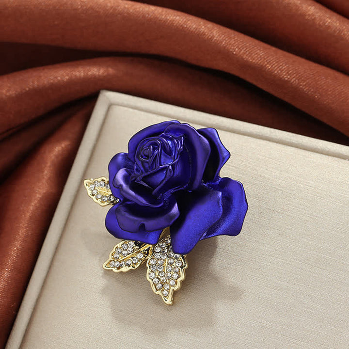 Broche fleur en strass rose rouge bleu