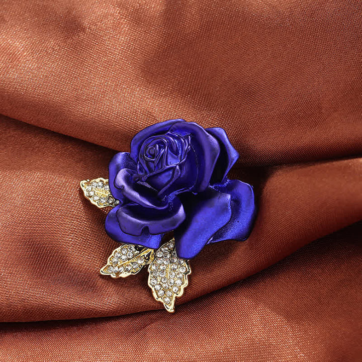 Broche fleur en strass rose rouge bleu