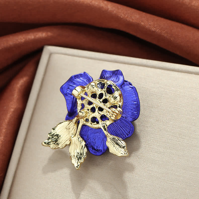 Broche fleur en strass rose rouge bleu