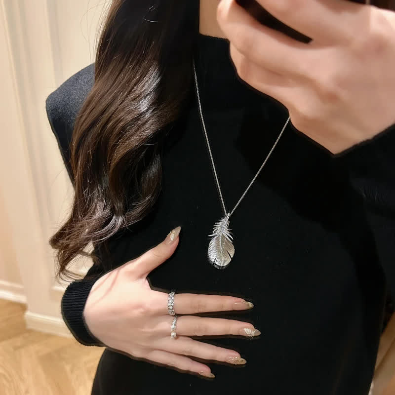 Broche pendentif plume en strass brillant pour femme