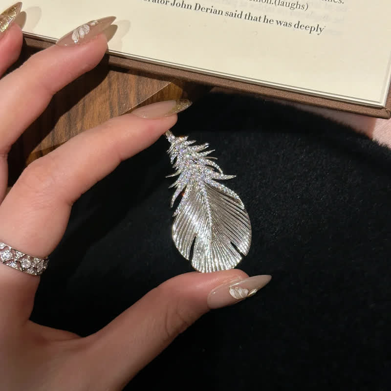 Broche pendentif plume en strass brillant pour femme