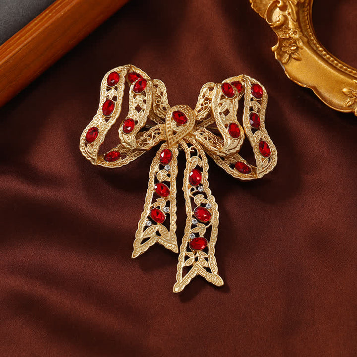 Broche fantaisie en forme de nœud papillon en ruban métallique ondulé doré pour femme