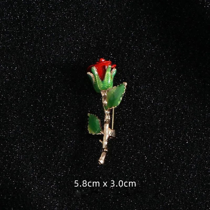 Broche rose pistolet vintage Accessoires de chemise