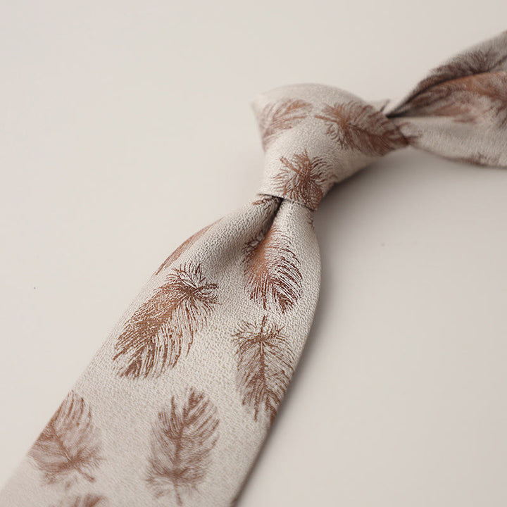 Cravate en jacquard vintage à plumes flottantes pour homme