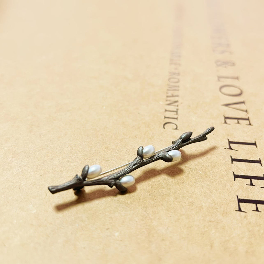 Broche branche vintage en alliage de perles de bois