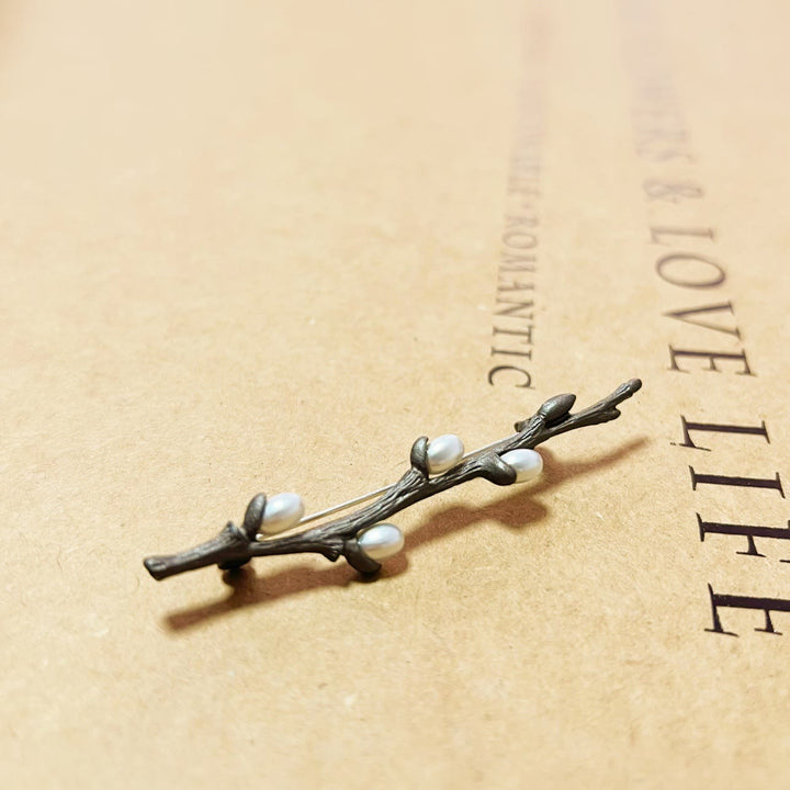 Broche branche vintage en alliage de perles de bois