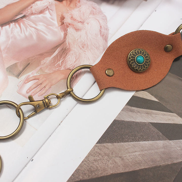 Ceinture vintage turquoise à rivets et fermoir en métal