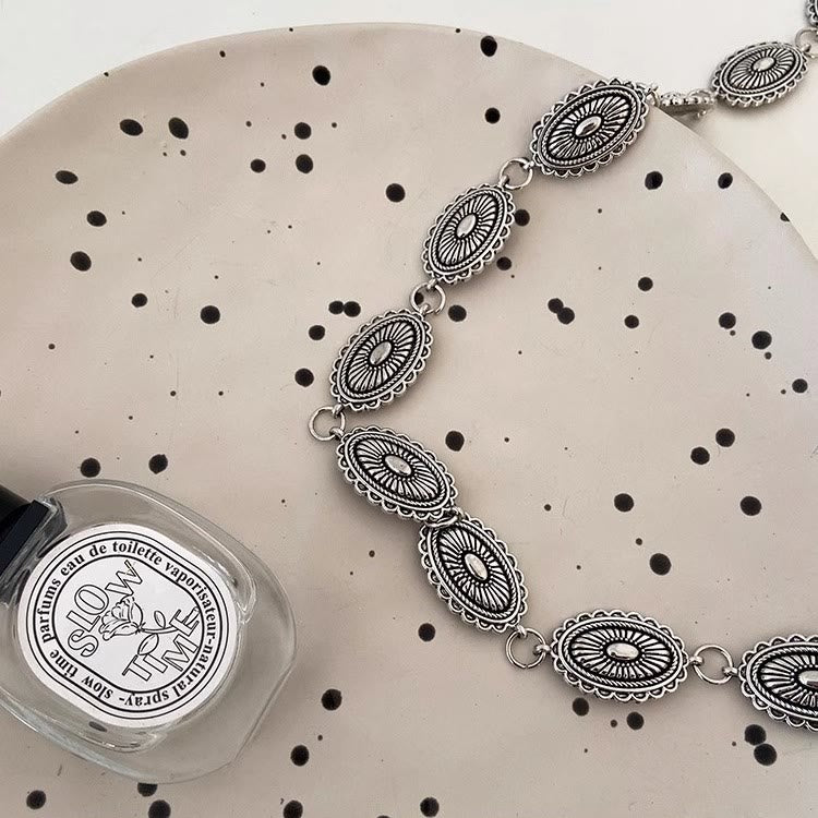 Ceinture ethnique vintage sculptée avec fermoir en métal