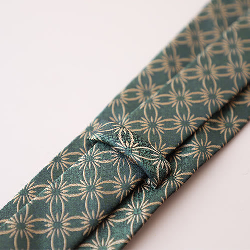 Cravate à motif floral vert marguerite pour homme
