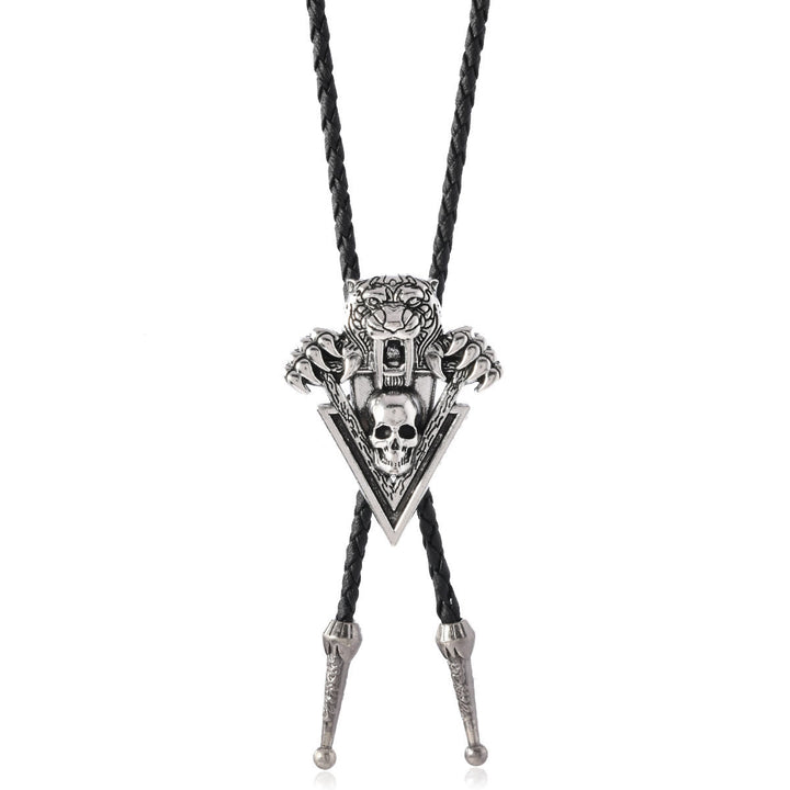 Cravate bolo vintage western avec crâne de tigre et dents pointues
