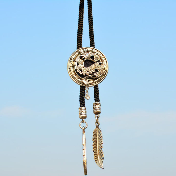 Cravate bolo Western en strass et plumes