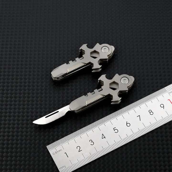 Porte-clés mini couteau pliant multifonctionnel en titane Cross