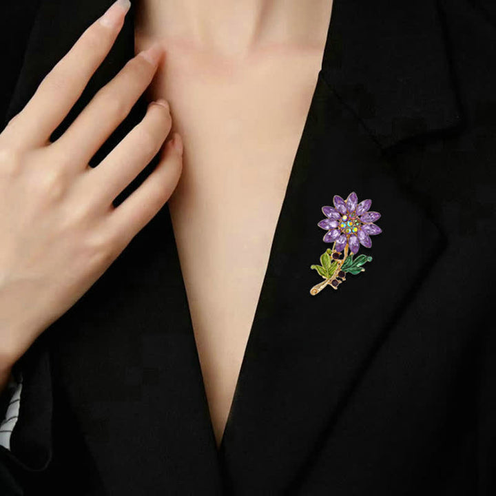 Broche tournesol violette en strass pour femme