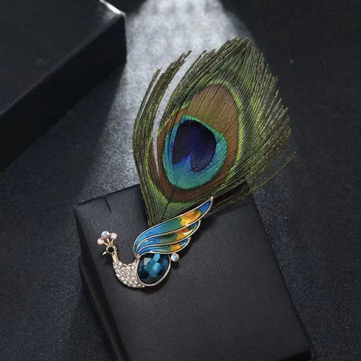 Broche ethnique en cristal avec plumes d'œil de paon pour femme