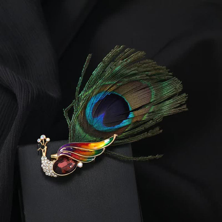 Broche ethnique en cristal avec plumes d'œil de paon pour femme