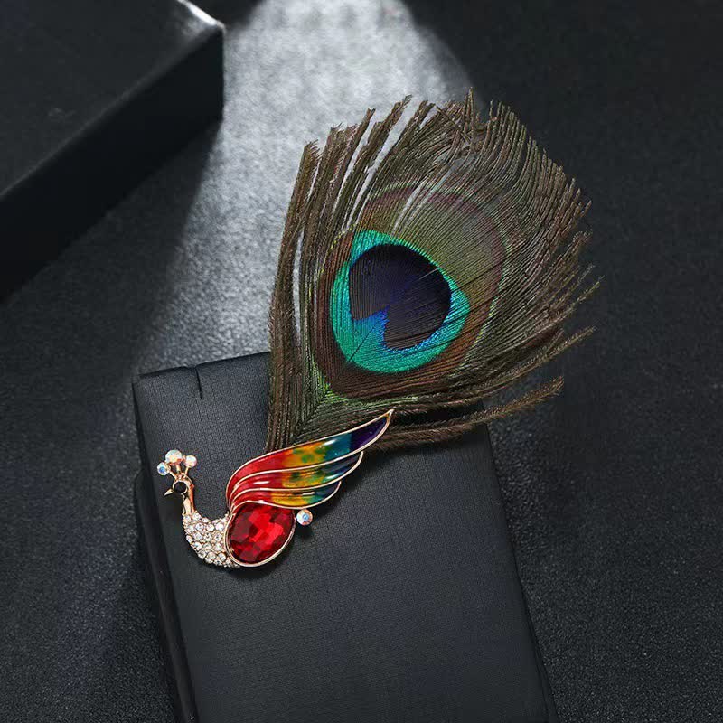Broche ethnique en cristal avec plumes d'œil de paon pour femme