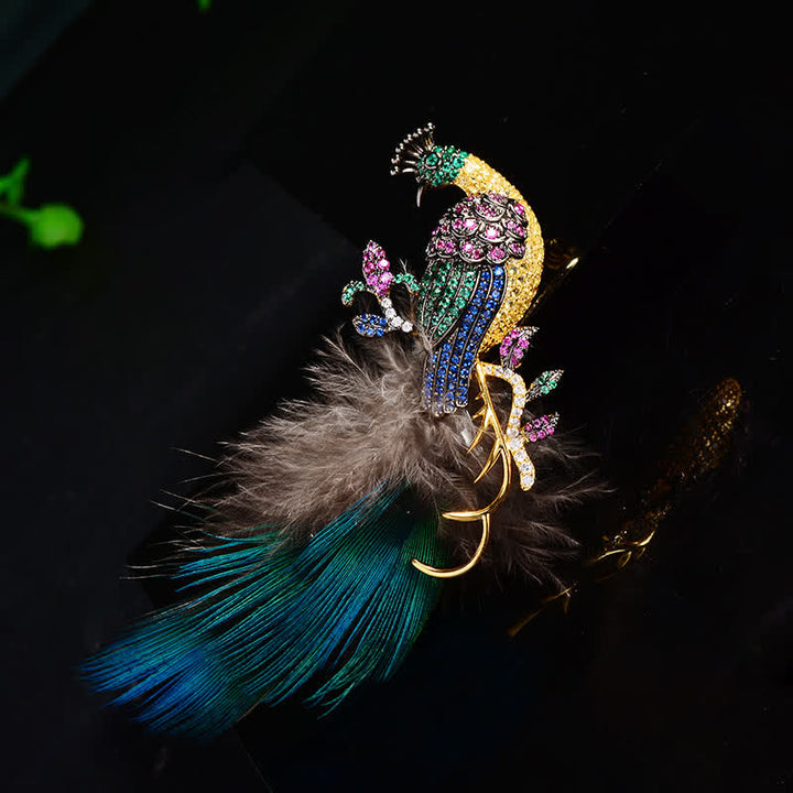 Broche plume de paon en strass pour femme