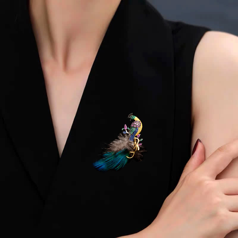 Broche plume de paon en strass pour femme