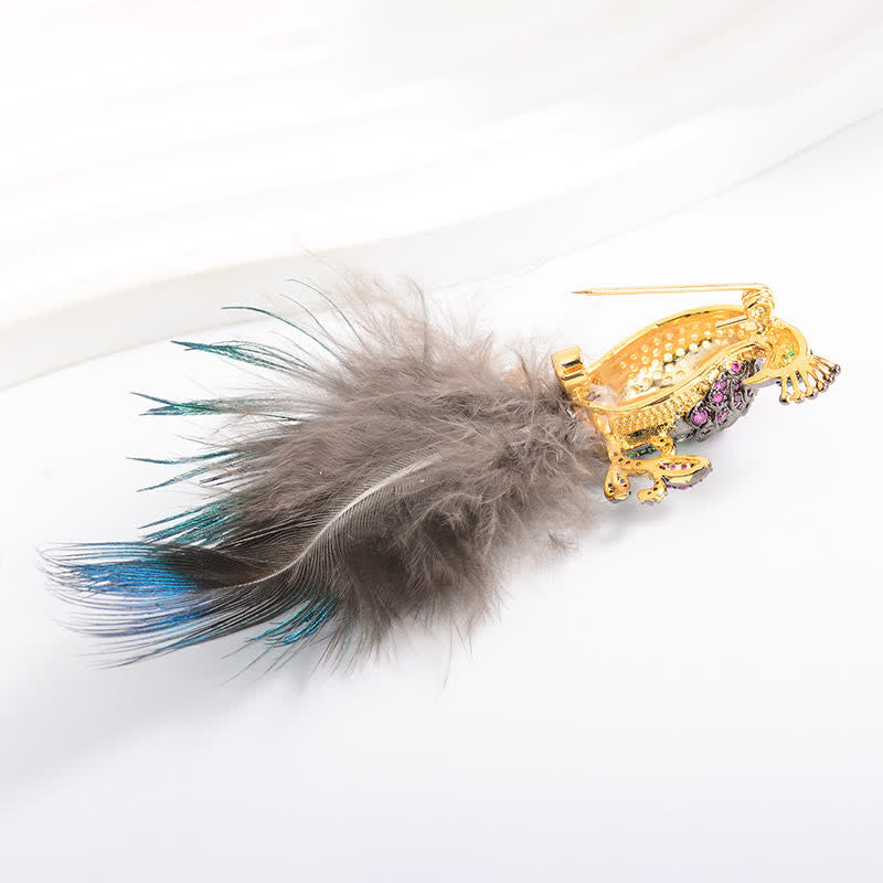 Broche plume de paon en strass pour femme