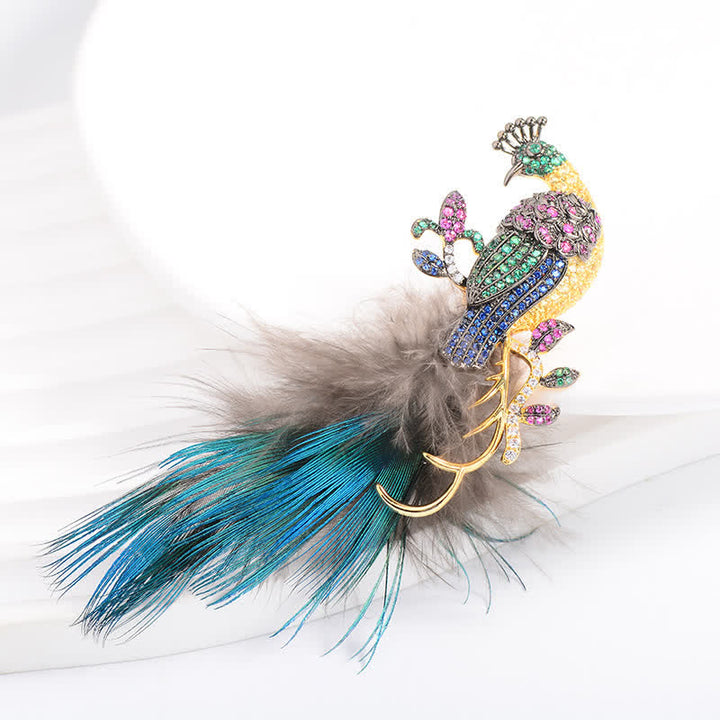 Broche plume de paon en strass pour femme