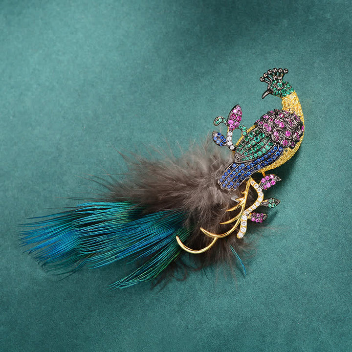 Broche plume de paon en strass pour femme