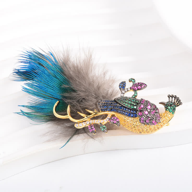 Broche plume de paon en strass pour femme
