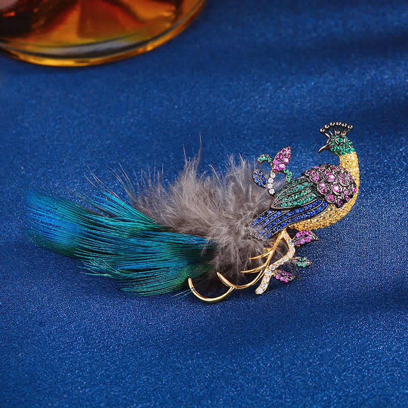 Broche plume de paon en strass pour femme