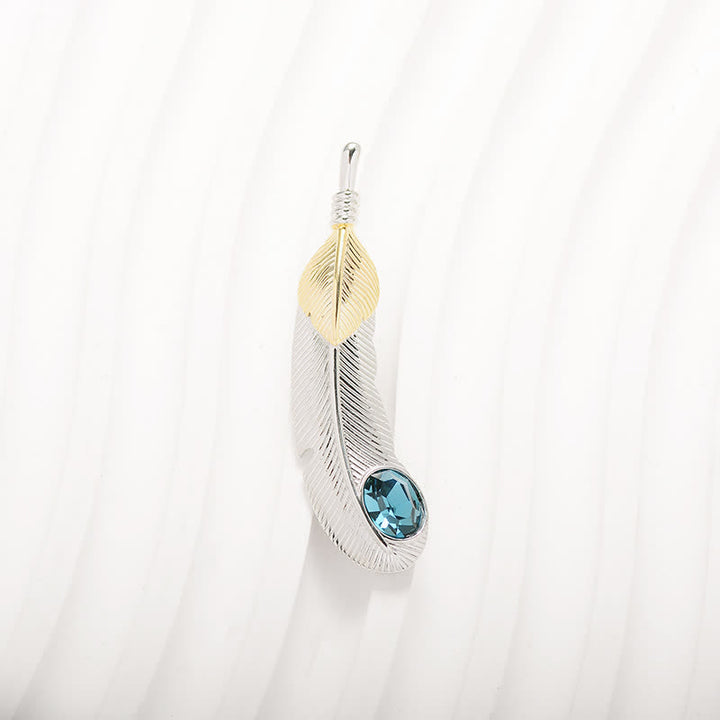 Broche unisexe en forme de plume avec faux cristal bleu