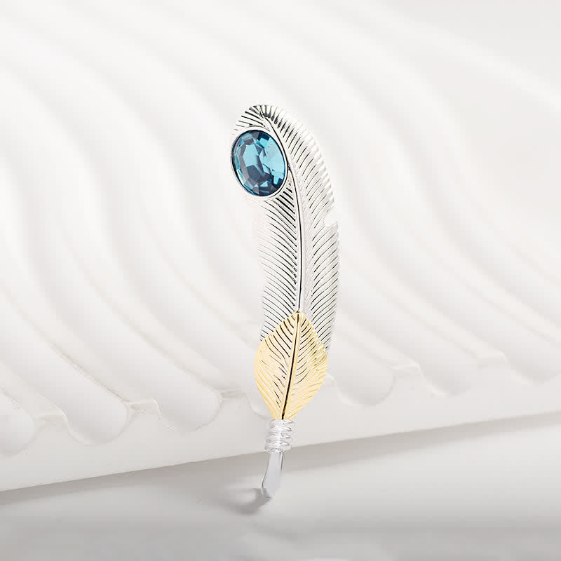 Broche unisexe en forme de plume avec faux cristal bleu