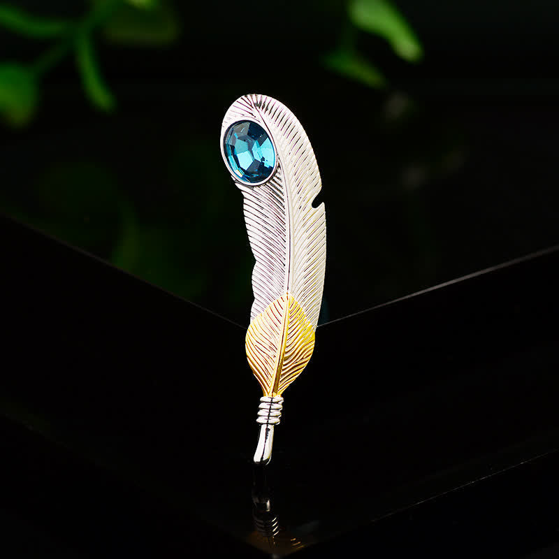 Broche unisexe en forme de plume avec faux cristal bleu