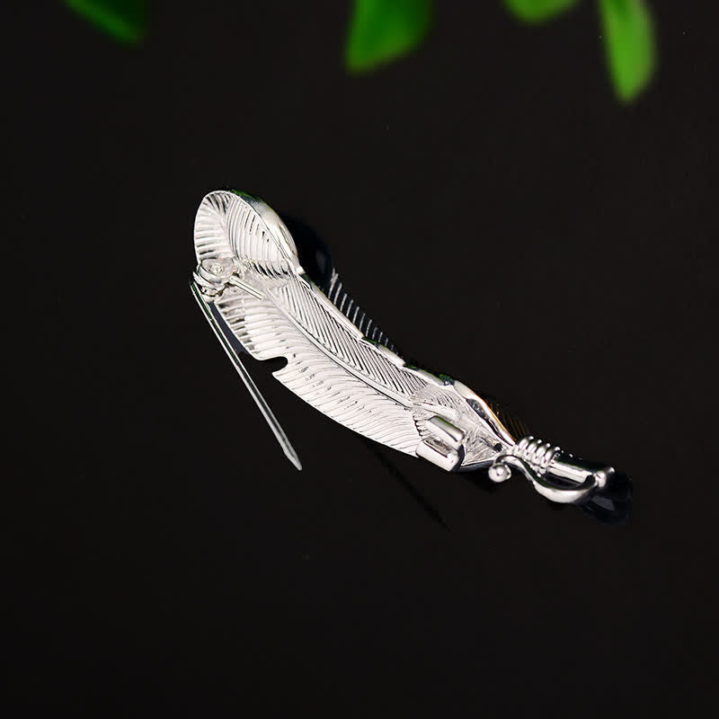 Broche unisexe en forme de plume avec faux cristal bleu