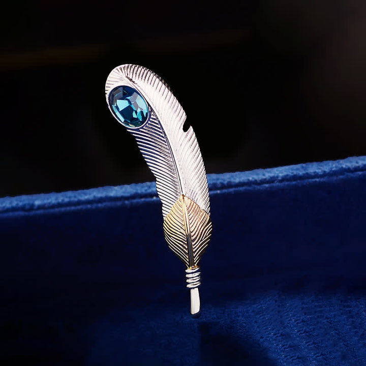 Broche unisexe en forme de plume avec faux cristal bleu