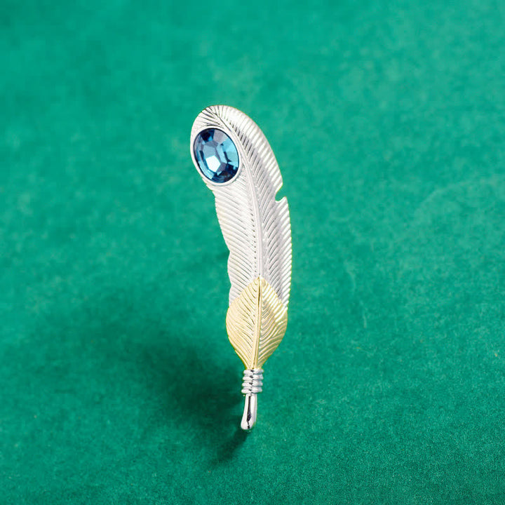 Broche unisexe en forme de plume avec faux cristal bleu