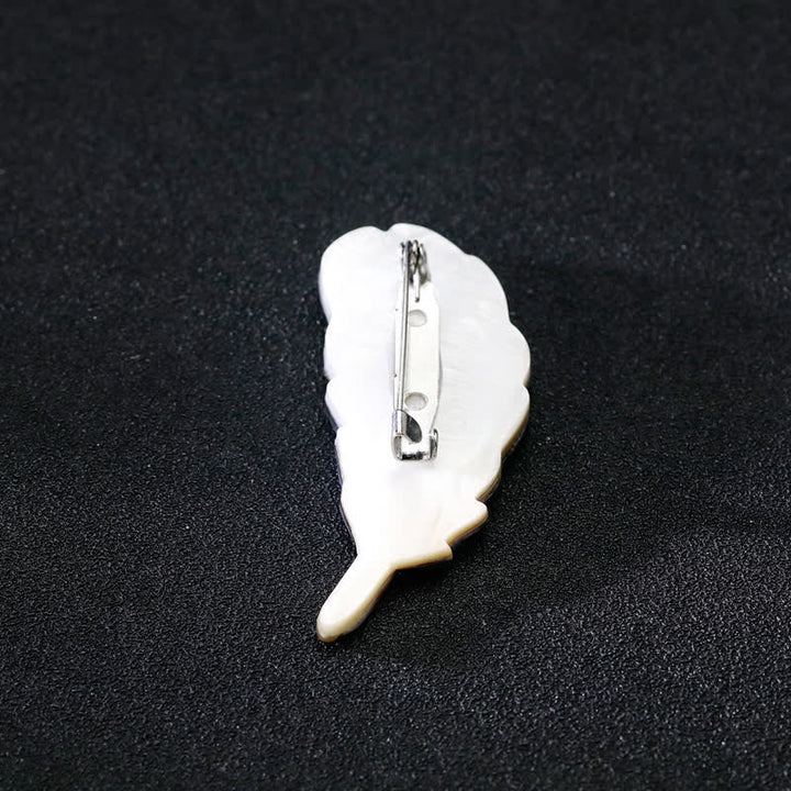 Broche unisexe en forme de plume en coquillage d'ormeau naturel