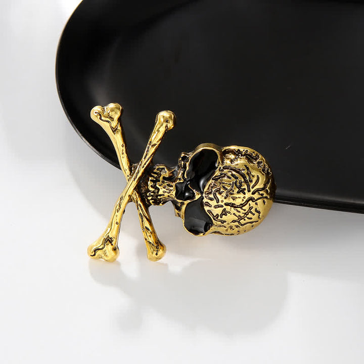 Broche décorative punk en forme de tête de mort et d'os croisés