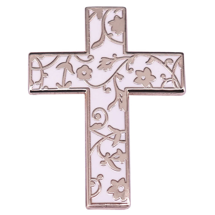 Broche en émail avec croix florale