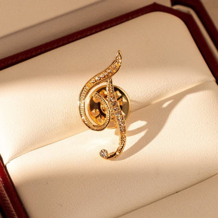 Broche en strass avec initiale 26 en or