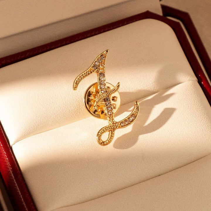 Broche en strass avec initiale 26 en or