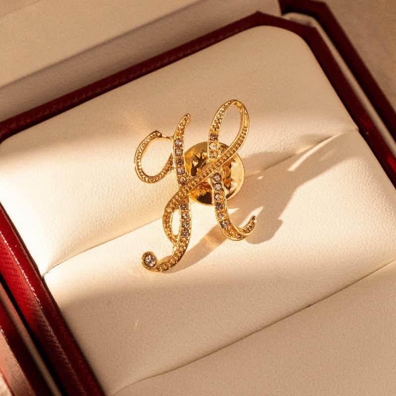 Broche en strass avec initiale 26 en or