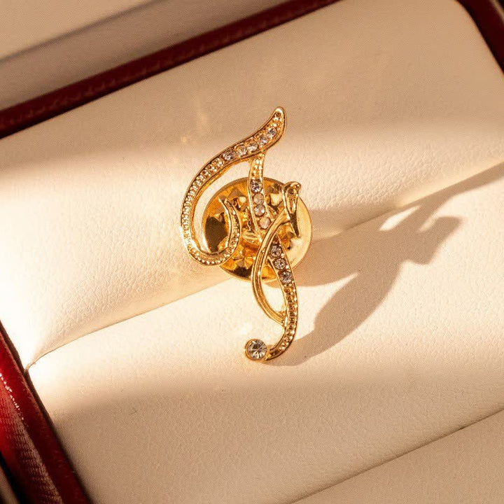 Broche en strass avec initiale 26 en or