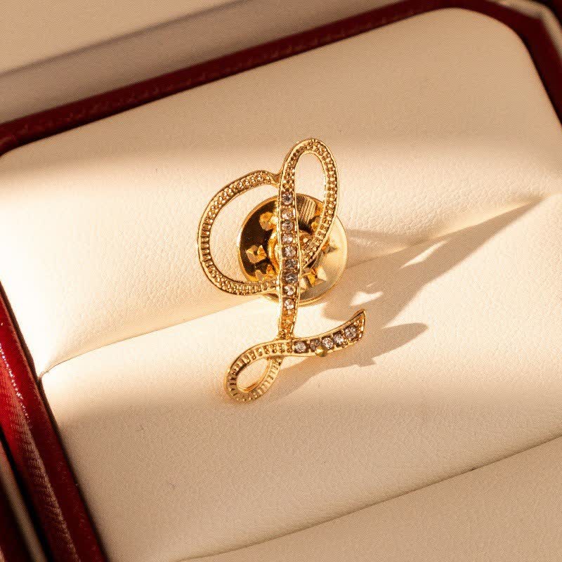 Broche en strass avec initiale 26 en or