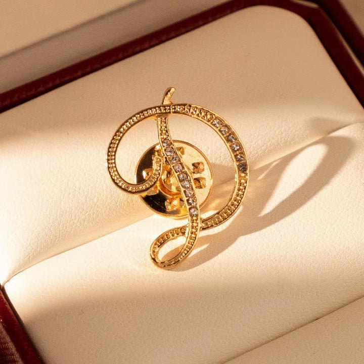 Broche en strass avec initiale 26 en or