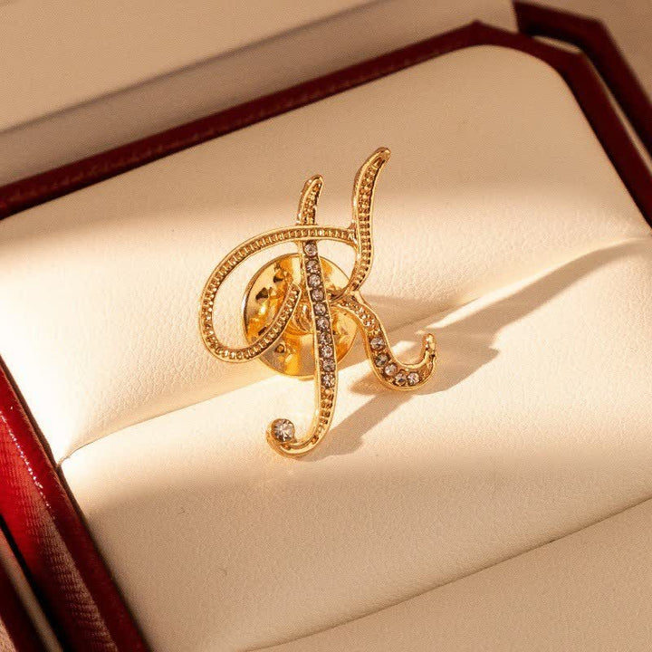 Broche en strass avec initiale 26 en or